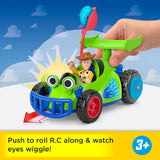 Imaginext Toy Story R.C. car with Woody figure seated inside and hand pushing the launcher handle