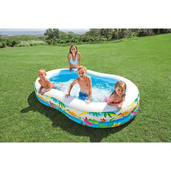 Alt: Four children splashing in the Intex Paradise Seaside inflatable pool on a lawn