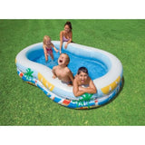 Alt: Children and an adult splashing in the Intex Paradise Seaside inflatable pool on grass
