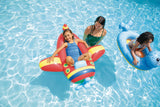 Red plane and blue seal Intex Pool Cruisers floats in a swimming pool with children and an adult