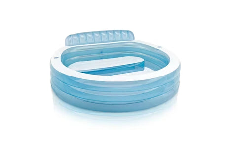 Empty Intex Swim Center Family Lounge Pool inflated on a plain background