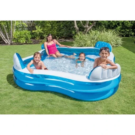 Family using the Intex Swim Center Family Lounge Pool outdoors