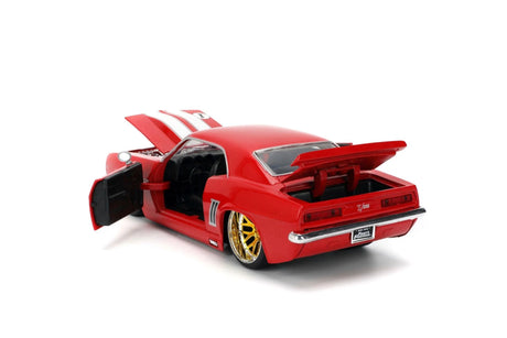 Rear three-quarter view of Jada 1969 Chevrolet Camaro Z28 1:24 die-cast with opening doors, opening bonnet and gold alloy wheels on white background
