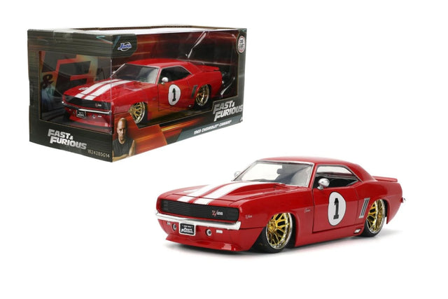 Jada Fast and Furious 1969 Chevrolet Camaro Z28 1:24 die-cast model in red with white racing stripes and gold wheels shown with retail packaging