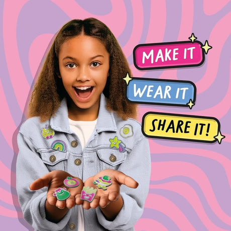 Child wearing finished John Adams Pin Badge Maker badges and holding four colourful badge designs