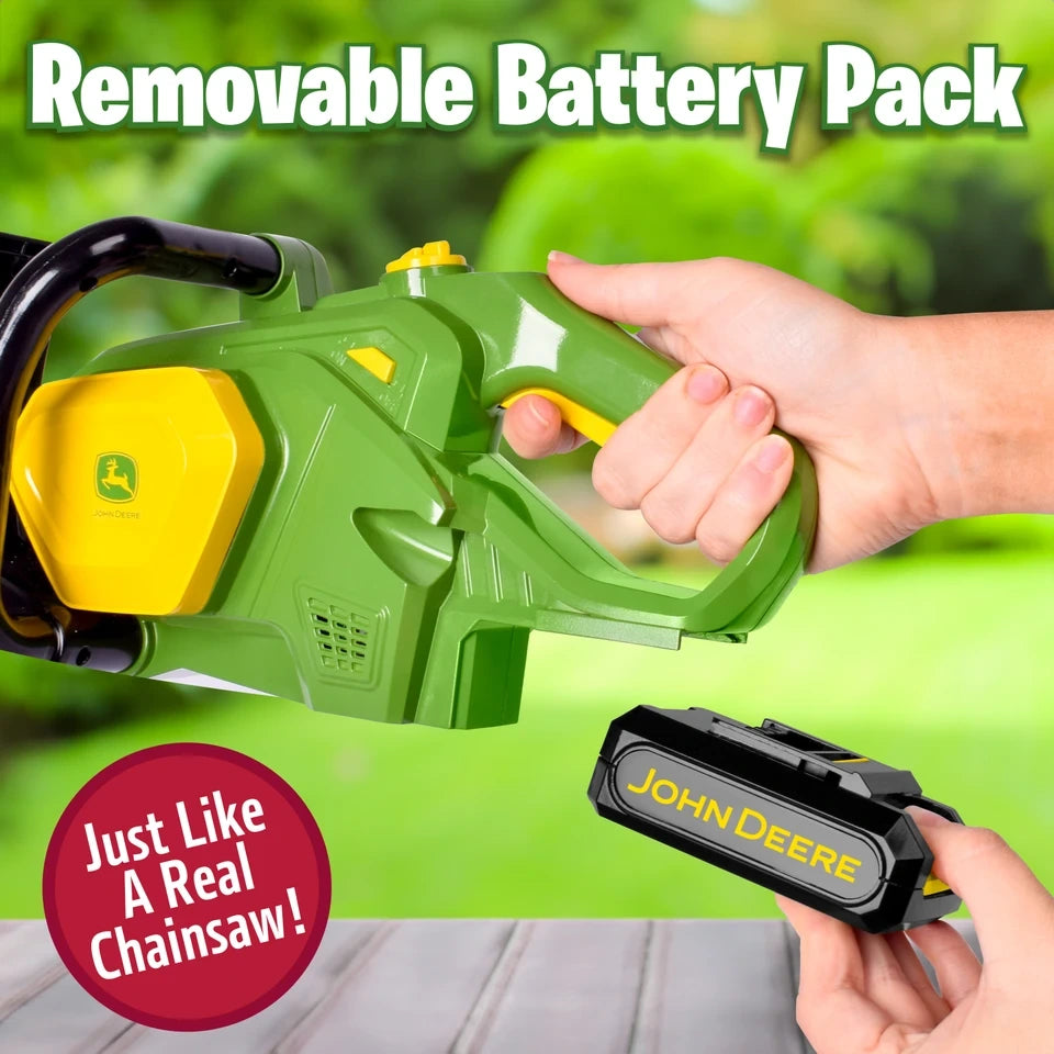 John Deere Motorised Chainsaw rear handle with battery pack being removed by hand