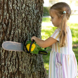 John Deere Motorised Chainsaw held against tree trunk by child using both handles