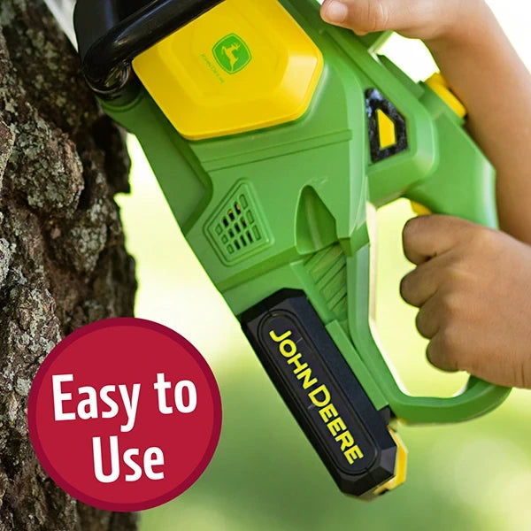 John Deere Motorised Chainsaw close view of rear grip and trigger while held against tree trunk