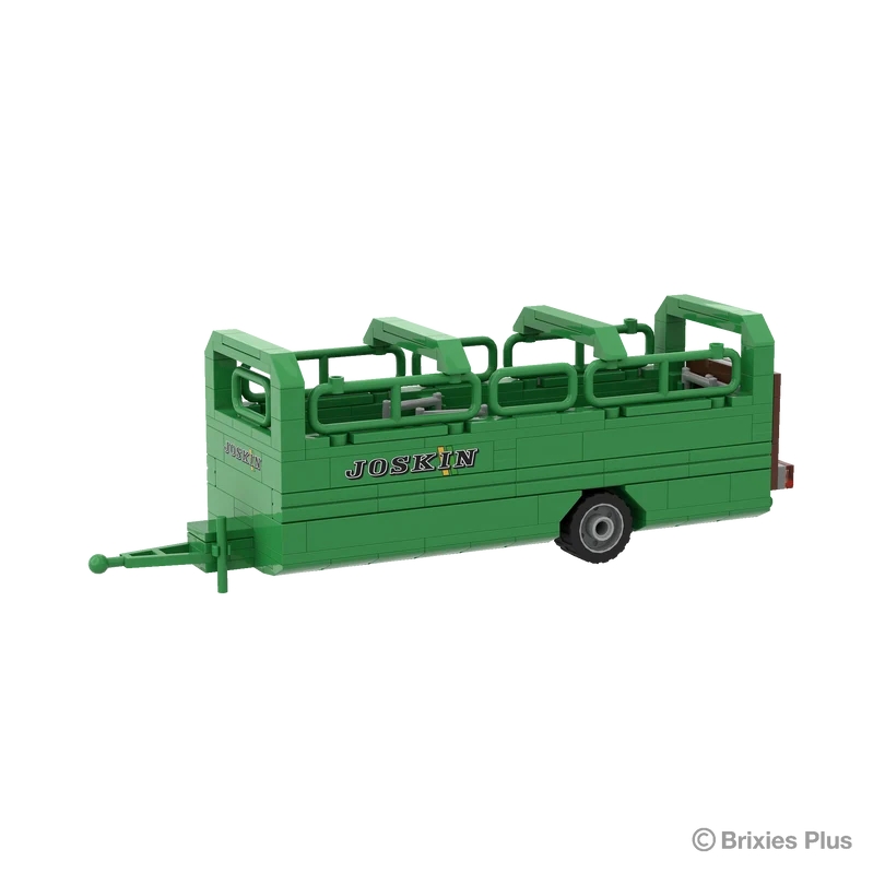 Front angled view of the BRIXIES Plus Joskin Betimax showing the drawbar, green livestock body, upper rail sections and JOSKIN branding