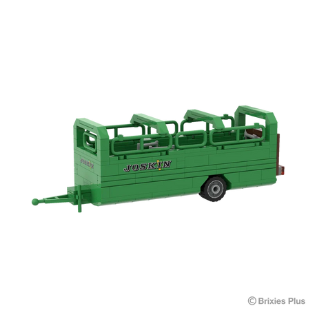 Front angled view of the BRIXIES Plus Joskin Betimax showing the drawbar, green livestock body, upper rail sections and JOSKIN branding