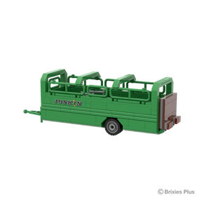 BRIXIES Plus Joskin Betimax viewed from the rear side showing the brown closed rear gate, rear lights, green livestock rails and drawbar