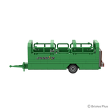BRIXIES Plus Joskin Betimax livestock trailer in full side profile with the drawbar extending left, green side panels, open upper rails and single axle visible