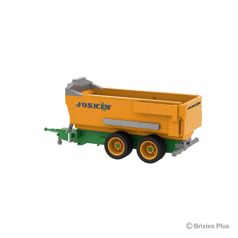 BRIXIES Plus Joskin Trans-KTP viewed from the rear side with the green drawbar extending left, orange tipping body and tandem axle running gear visible