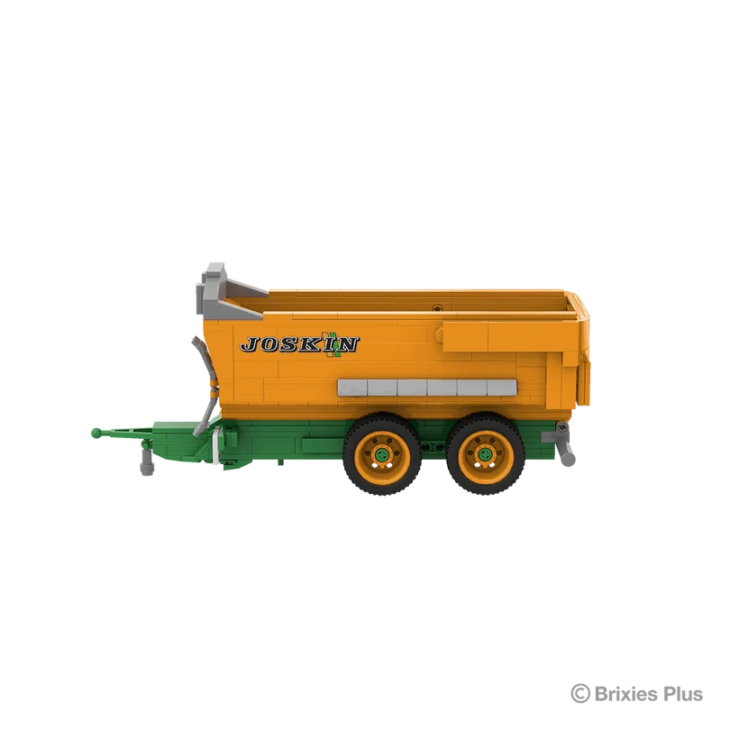BRIXIES Plus Joskin Trans-KTP viewed from the rear side with the green drawbar extending left, orange tipping body and tandem axle running gear visible