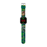 Full view of Jurassic World LED watch showing jungle-green strap with detailed T. rex and Velociraptor prints in Ireland.