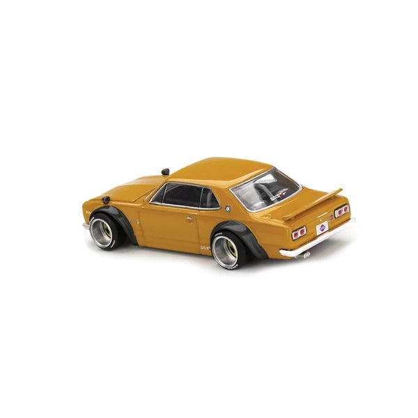 Kaido House Nissan Skyline 2000 GT-R Kaido Street V2 viewed from the rear three quarter angle, showing Safari Gold bodywork, black flared arches, rear spoiler and chrome bumper