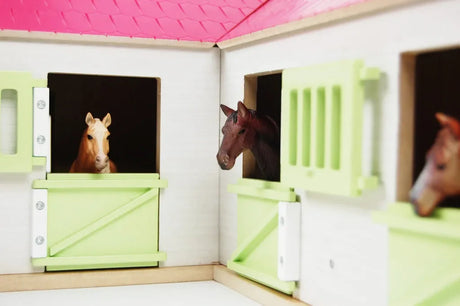 Kids Globe pink horse corner stable front view shown with horse figures