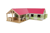 Close-up of Kids Globe pink horse stable doors with horse figures in the boxes