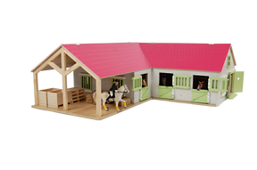 Close-up of Kids Globe pink horse stable doors with horse figures in the boxes
