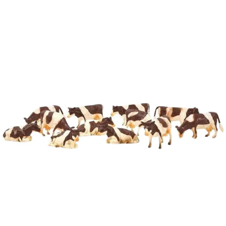 Kids Globe brown and white toy cows 12 pack displayed loose 1:32 scale Ireland