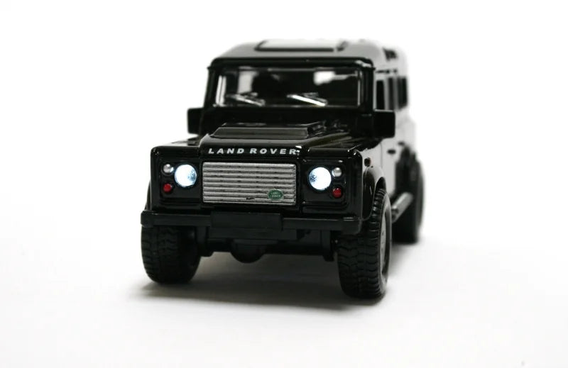 Kids Globe Land Rover Defender black front view with working lights 1:32 scale Ireland