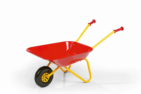 Red and yellow kids metal wheelbarrow with yellow frame in three quarter view
