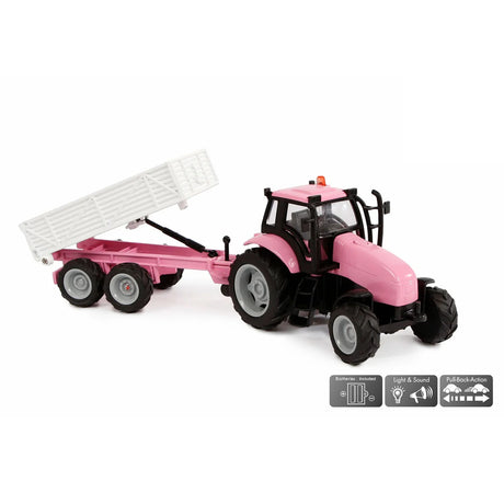 Pink tractor and white trailer farm toy with the trailer tipped up