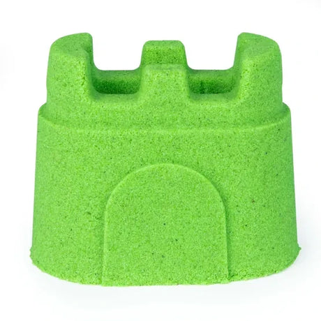 Green Kinetic Sand formed into a sandcastle shape