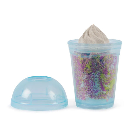 Kinetic Sand Smoothie Mixer smoothie cup filled with layered coloured sand and white topping