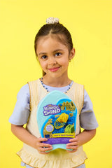 Child holding the closed Kinetic Sand Surf N' Sand Paradise surfboard shaped case