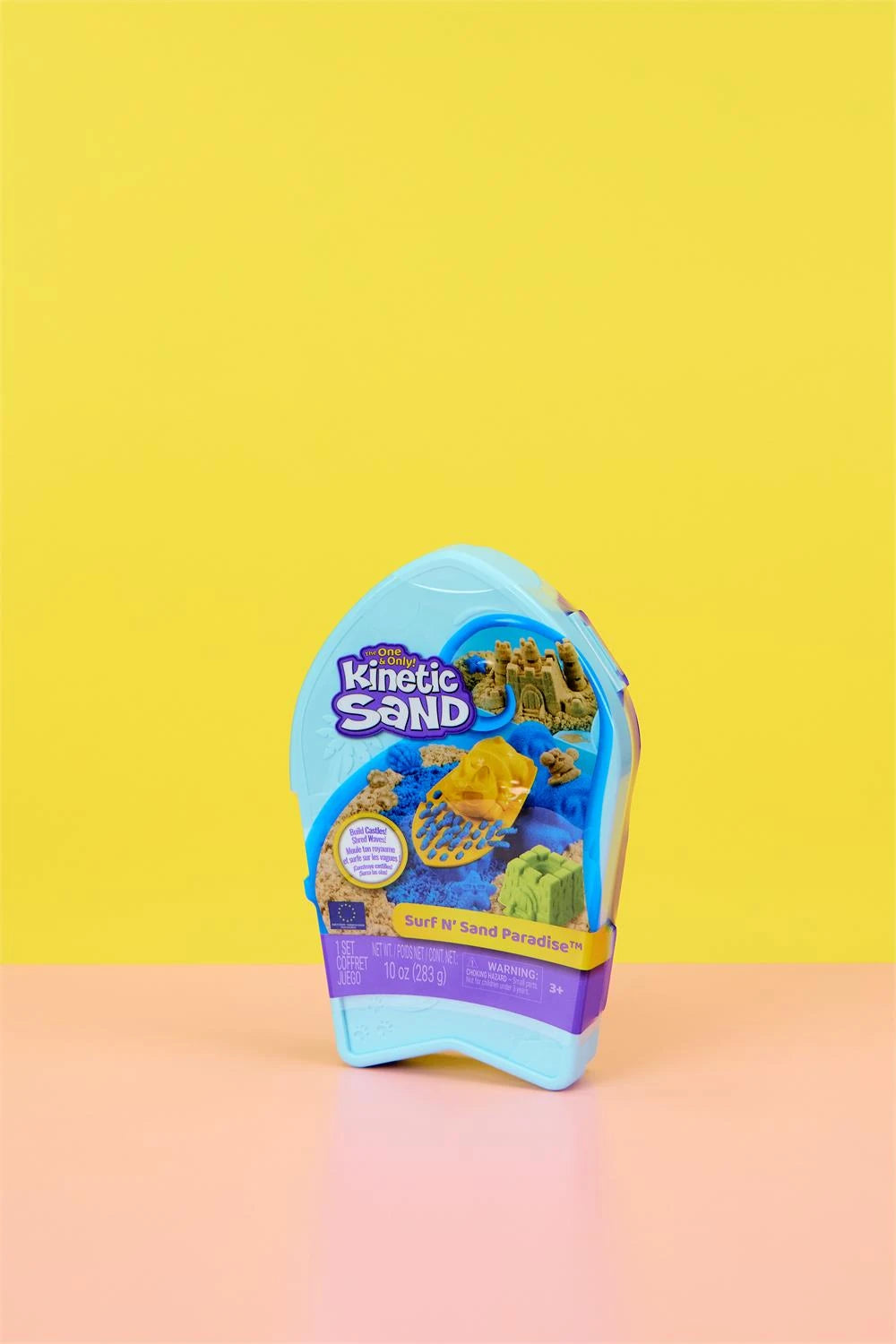 Kinetic Sand Surf N' Sand Paradise closed blue surfboard shaped case with product sleeve