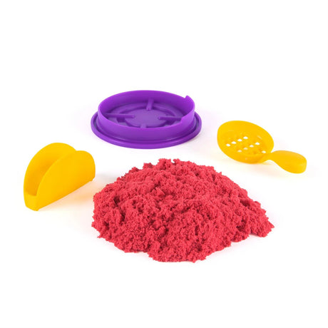Kinetic Sand Surprise Takeout Treats with red sand, yellow taco mould, purple mould and yellow spoon