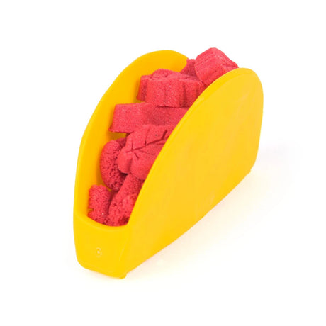 Kinetic Sand Surprise Takeout Treats taco shell filled with pink sand pieces