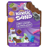Front of Kinetic Sand Sweet Station packaging with purple design and chocolate bar shaped case