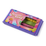 Purple Kinetic Sand accessory with pink, yellow and green sand visible through the centre opening