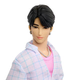 KPop Demon Hunters Saja Boys Jinu Doll close view showing his black hair, face, white checked shirt and pink top
