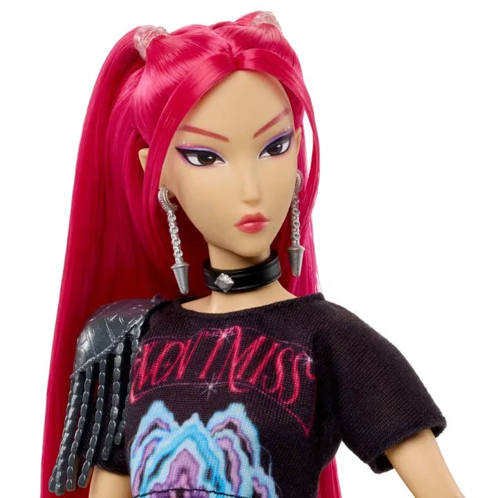 KPop Demon Hunters HUNTR/X Mira Doll close view showing her long pink hair, face, earrings, black top and shoulder detail