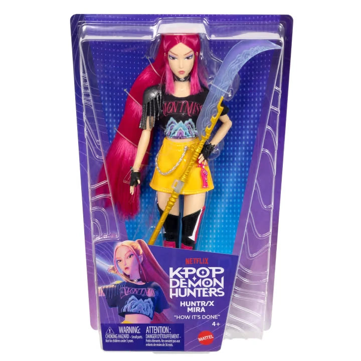 KPop Demon Hunters HUNTR/X Mira Doll in retail packaging with purple HUNTR/X branding and included Curved Moon Sword