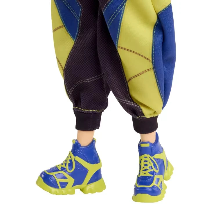 KPop Demon Hunters HUNTR/X Zoey Doll close view of her blue and yellow baggy trousers and trainers
