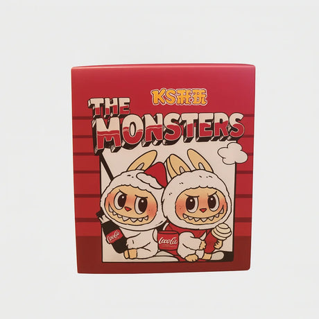 L Monsters collectable toy box with red background and two cartoon characters holding drinks – Ireland