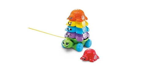LeapFrog Nest & Count Turtle Tower with stacked turtles, pull string and red turtle beside it