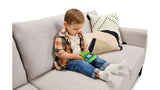 Child playing with LeapFrog Preschool Game & Go handheld on a sofa – Ireland.