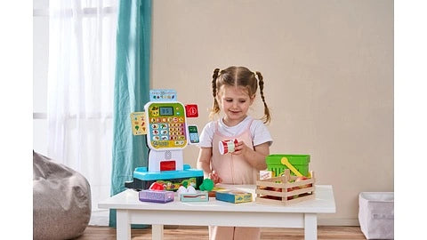 LeapFrog Scan & Learn Checkout displayed with basket, groceries, play notes, coins and card