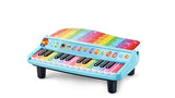 LeapFrog Twinkle Lights Learning Piano showing the turquoise keyboard, black and coloured keys, instrument buttons and rainbow panel