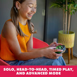 Girl playing Learning Resources BrainBolt handheld memory game