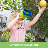Child observing nature with green Kidnoculars outdoors – Ireland