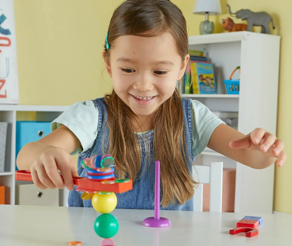 Child experimenting with magnetic STEM set from Learning Resources – Ireland