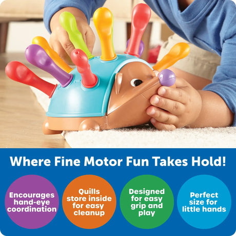Child placing bright quills into Spike’s back for fine motor play – Ireland