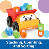 Learning Resources Tony the Peg Stacker Dump Truck with stacking barrels