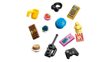 LEGO Friends Heartlake City Friends Club House 42689 accessories including a blue helmet, headphones, gaming controller, walkie talkie, popcorn, drinks and miniature food.